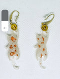 White Playful Cat Dangles