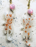 White Playful Cat Dangles